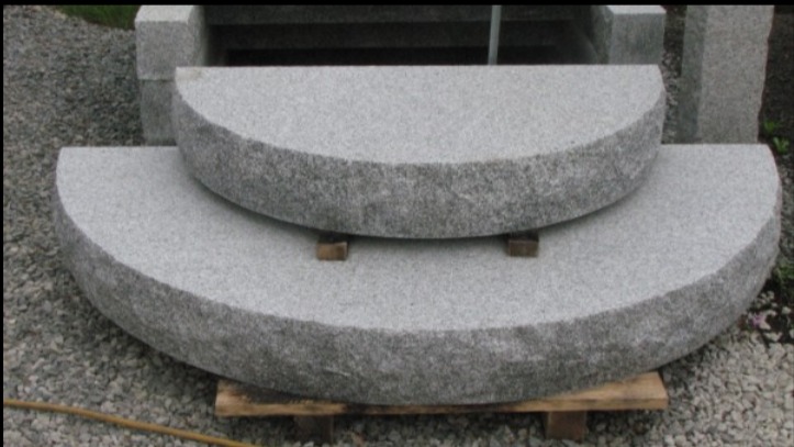 Stacked Light Grey Granite Slabs